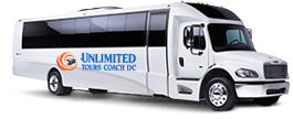 A branded, all-white minibus with the Unlimited Tours Coach DC logo on it